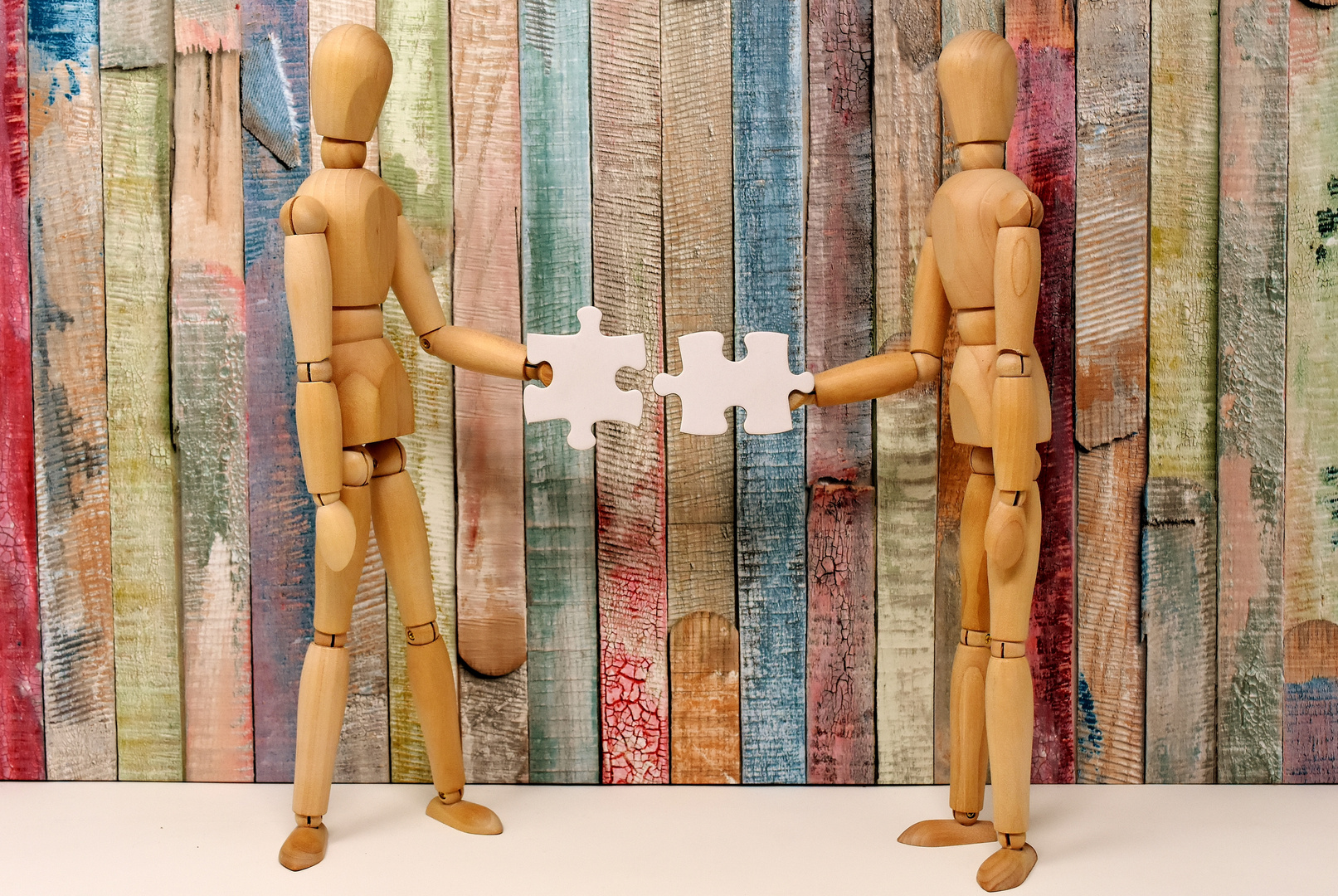 Wooden People Display Joining Puzzle Pieces